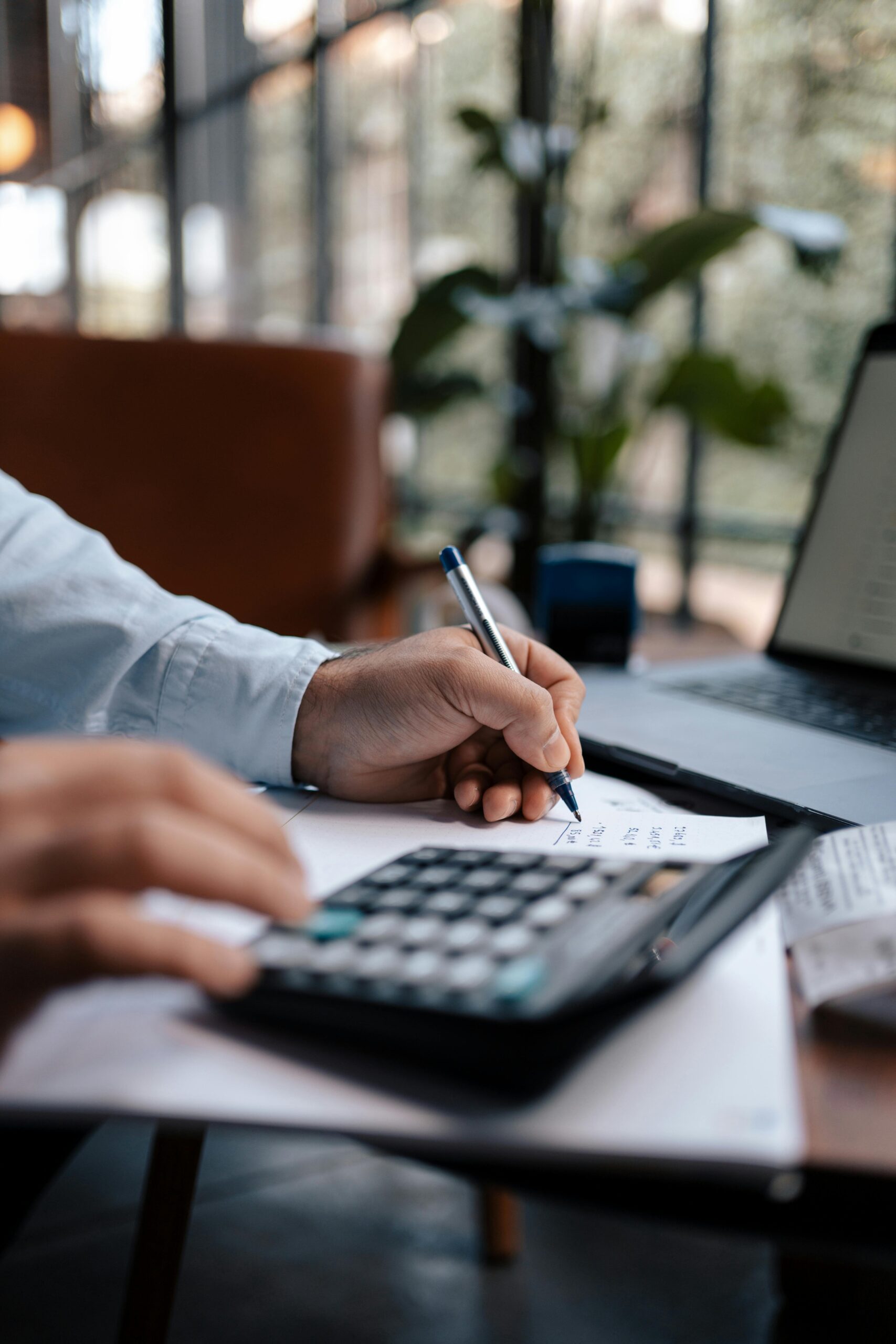 Business professionals reviewing financial data and performance trends during a run rate analysis discussion